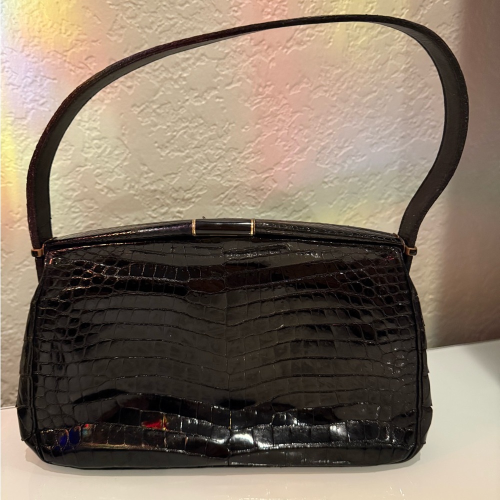 Unique vintage 1950s glossy Crocodile black leather handbag for any occasion
